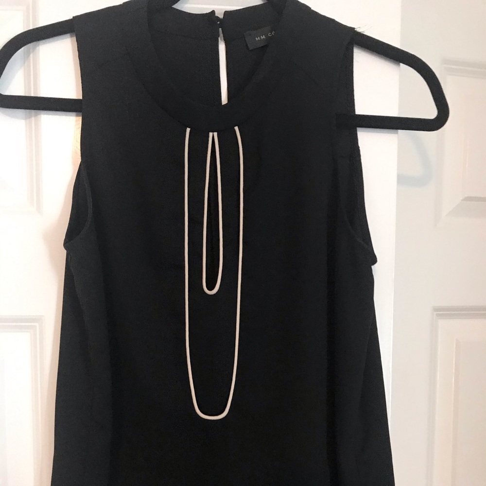 Black sleeveless top with detailed keyhole